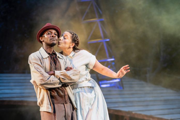 John Pfumojena and Christina Modestou as Enoch Snow and Carrie Pipperidge in Carousel at Regent's Park Open Air Theatre. Photo by Johan Persson