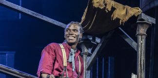 Newsies – review Michael Ahomka-Lindsay as Jack Kelly in Disney's NEWSIES, credit Johan Persson