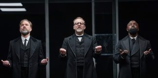 The Lehman Trilogy – review The Lehman Trilogy West End 2023 Image 1 L-R Hadley Fraser, Nigel Lindsay, Michael Balogun © Mark Douet