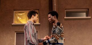 Beautiful Thing – review Raphael Akuwudike (Ste) and Rilwan Abiola Owokoniran (Jamie) in Beautiful Thing at Stratford East. Photographer The Other Richard
