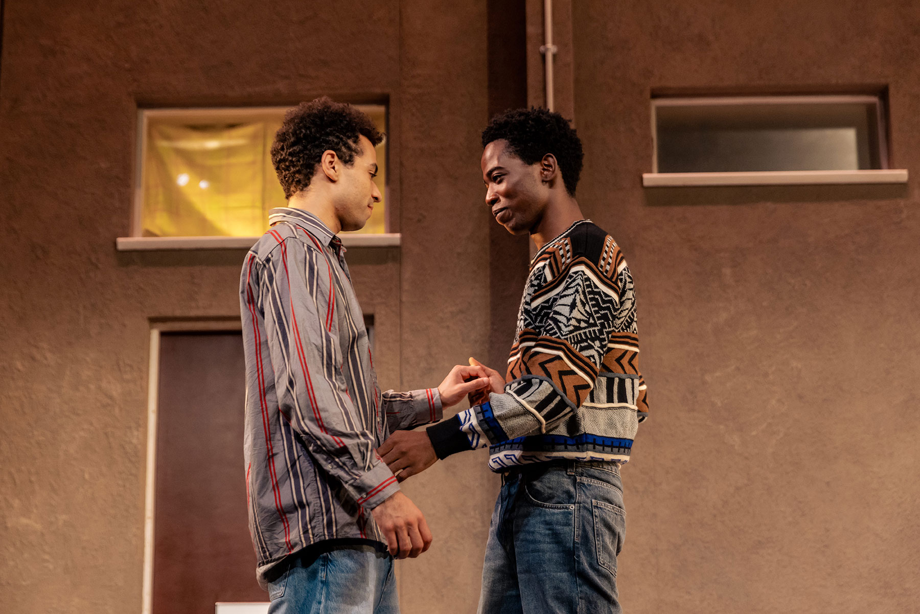 Raphael Akuwudike (Ste) and Rilwan Abiola Owokoniran (Jamie) in Beautiful Thing at Stratford East. Photographer The Other Richard