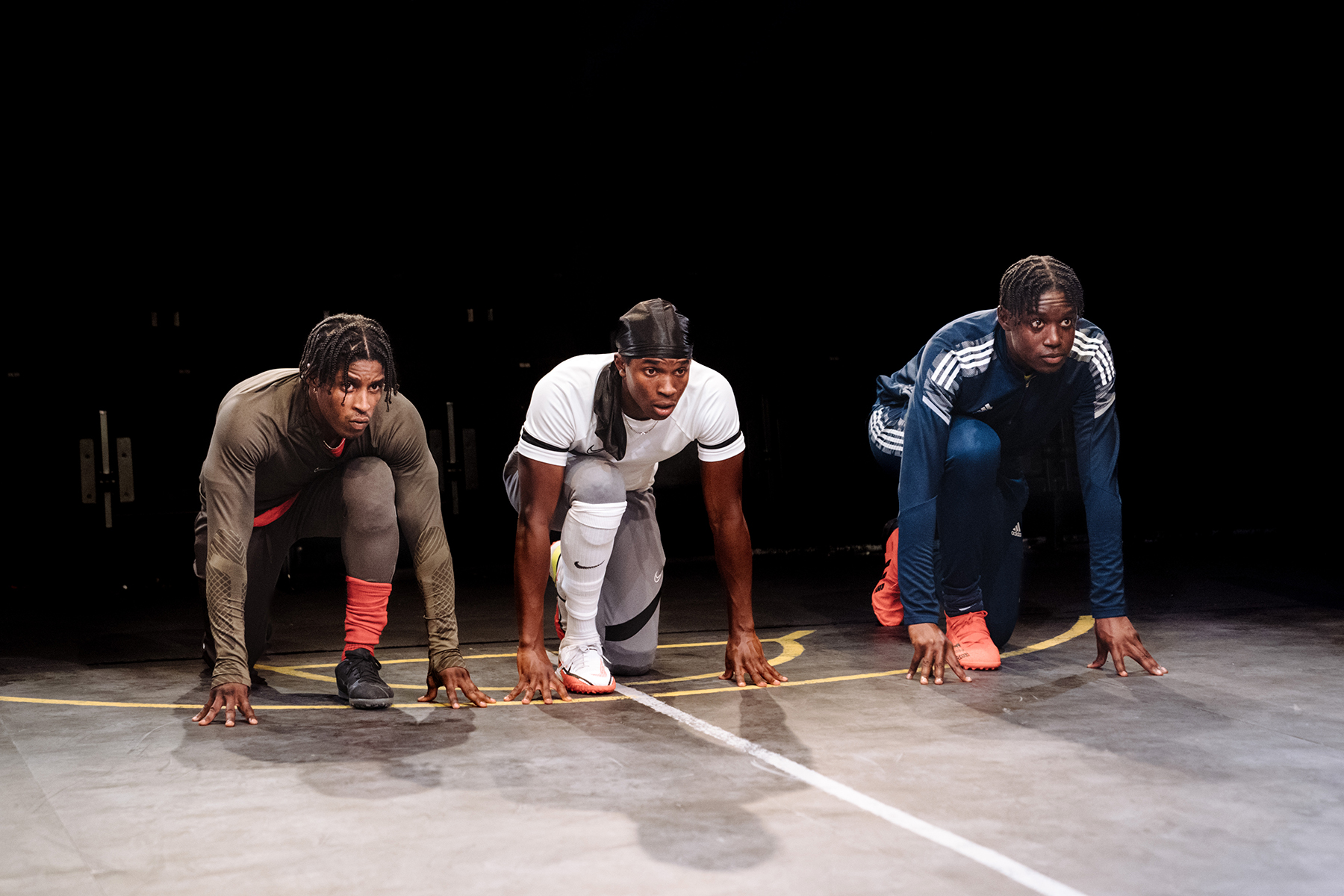 Red Pitch. Francis Lovehall (Omz) , Kedar Williams-Stirling (Bilal), Emeka Sesay (Joey). Credit - Helen Murray