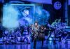Beetlejuice the Musical – review David Fynn as Beetlejuice and Hannah Nordberg as Lydia Deetz with Company © Johan Persson