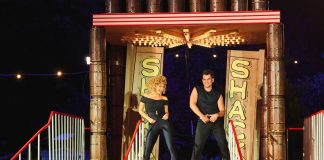 Grease the Immersive Movie Musical – review Stephanie Costi (L) (Sandy) and Giorgios Michaelides (R) (Danny) - credit Matt Crockett